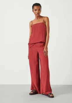 hush Trousers|Mabel Fluid Wide Leg Crinkle Trousers Rust